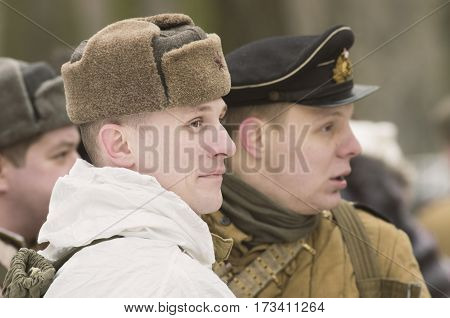 The park Ekaterinhof St. Petersburg (Russia) - February 23 2017: Military historical reconstruction of events of World War II.
Soviet soldiers awaiting battle formations.