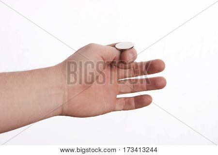 businessman hand throwing up a coin to make decision.heads and tails concept isolated on white