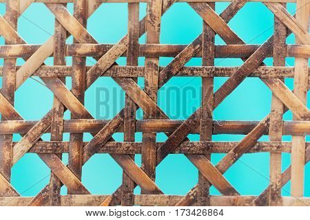 A macro photo of old wooden basketwork.