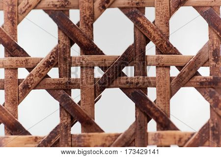 A macro photo of old wooden basketwork.