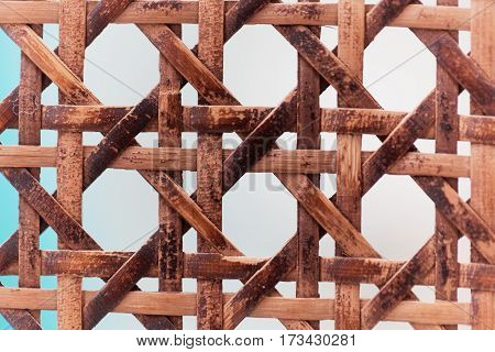 A macro photo of old wooden basketwork.