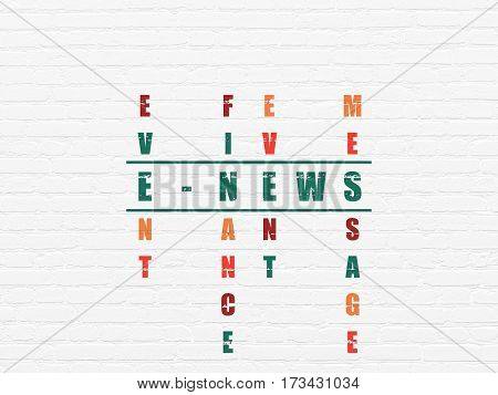 News concept: Painted green word E-news in solving Crossword Puzzle