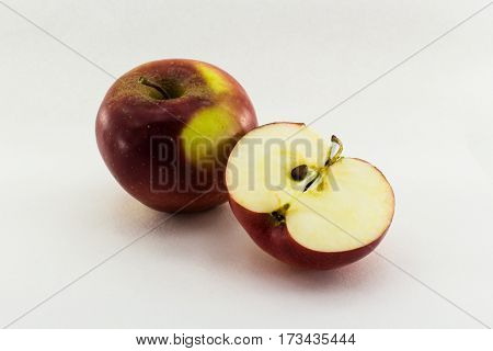 One and a half apple isolated on white background