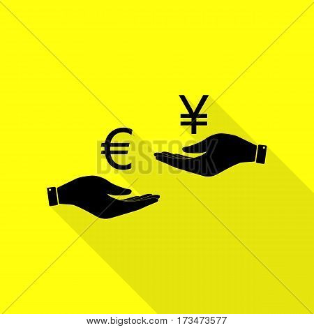 Currency exchange from hand to hand. Euro and Yen. Black icon with flat style shadow path on yellow background.