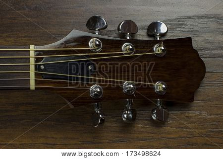 acoustic guitar neck fingerboard frets strings music case close inlay creativity art sound vibration play music guitarist