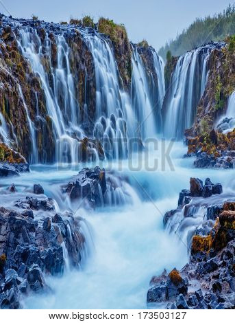 Dramatic views of the powerful Bruarfoss waterfall. Popular tourist attraction. Unusual and picturesque scene. Location place South Iceland, Europe. Artistic picture. Discover the world of beauty.