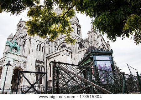 Close-up of Basilica Sacre Coeur on Montmartre hill in summer Paris France.