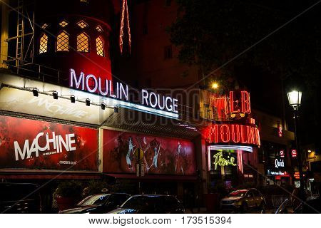 PARIS FRANCE - SEPTEMBER 19: Cabaret Moulin Rouge by night. French landmarks and travel destinations concept.