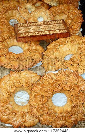 Freshly baked marriage bread for sale in a city centre shop Heraklion Crete Greece Europe.
