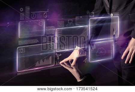 Male hands touching interactive table with purple cloudspace graphic on it 