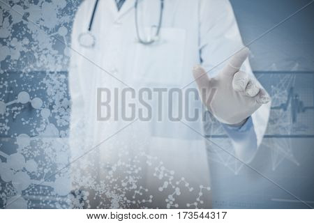 Doctor touching an digital screen against spiral pattern of helix model