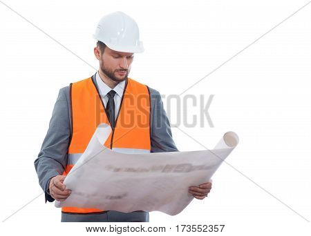 Plans improvement. Handsome mature bearded foreman in a formal suit and safety vest going through building project blueprints isolated on white copyspace professionalism confidence building industry