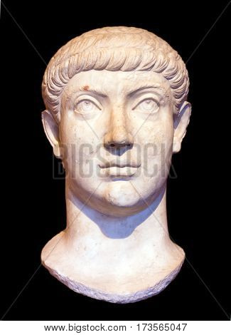Head of Roman emperor Constantius II or Constans, isolated on black background