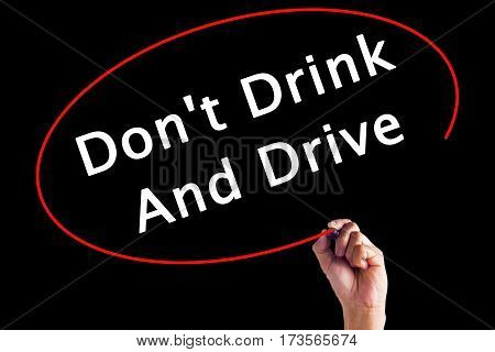 Hand Writing Don't Drink And Drive With A Marker Over Transparent Board
