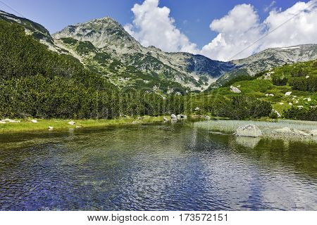 Landscape with Reflection of Muratov peak in river,  Pirin Mountain, Bulgaria