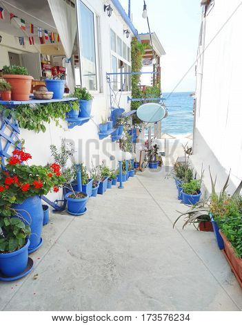street architecture detail in house building with bougainvillaea Greece