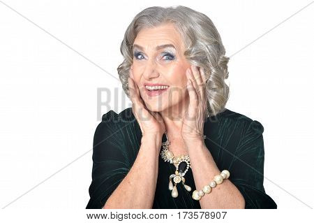 gorgeous mature woman posing against white background