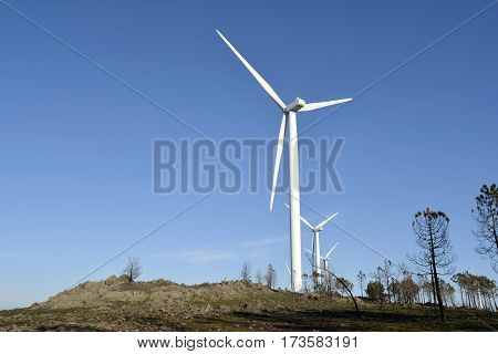 Aeolian Park with some wind machines at the top of the mountain range
