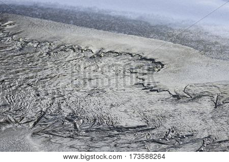 Break at the rivers edge ice during the thaw.