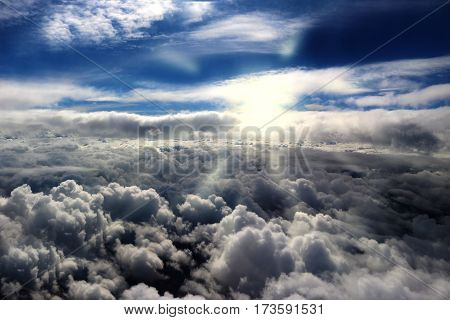 clouds seen from an airplane sun sunshine