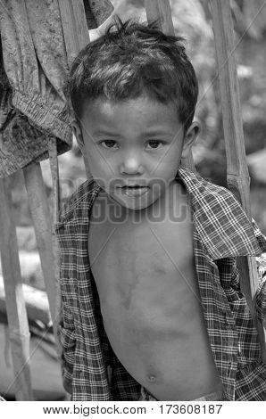 PHNOM PHEN, CAMBODIA MARCH 23: Unidentified street children posing on march 23 2013 in Phnom Phen,Cambodia.In Phnom Penh alone there are between 10,000 and 20,000 children live and work on the streets
