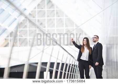 Businessman And Businesswomen having informal meeting in office and discussing plans
