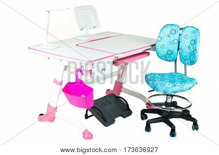Blue chair pink school table pink basket desk lamp and black support under legs on the white isolated background.