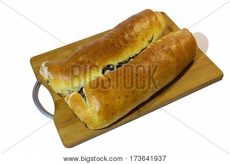 Poppy roll baked at home  on a wooden board. Isolated on white background.