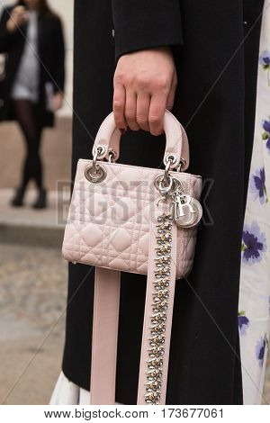 MILAN ITALY - FEBRUARY 23: Detail of bag outside Genny fashion show during Milan Women's Fashion Week on FEBRUARY 23 2017 in Milan.