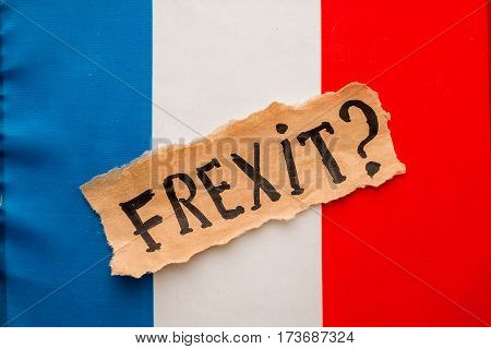 Elections in France.  FREXIT inscription on torn paper sheet. Politics concept