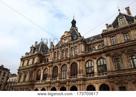 The facade of the building and clock the House (palace) commerce. Lyon. France.