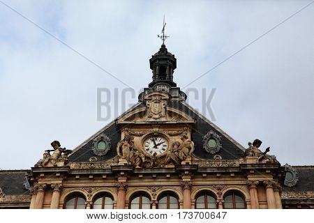 The facade of the building and clock the House (palace) commerce. Lyon. France.