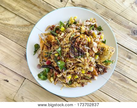 Fried fish with herb sauce spicy delicious food of Thailand.