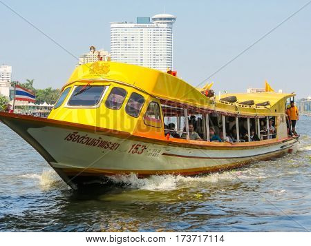 BANGKOK, THAILAND - JANUARY 17, 2014: Ferryboat public motorboat on Chao Phraya River. Bangkok, Thailand