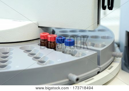 Quality Control Laboratory Medicine. Chromatograph Operation. Bottles Check On The Quality Of The Su