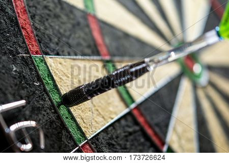one metall dart hit the double sixteen