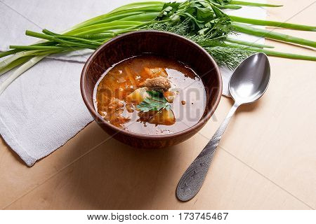 Borsch - Traditional Ukrainian And Russian Red Beetroot Soup With Red Beets In Clay Bowl With Metal