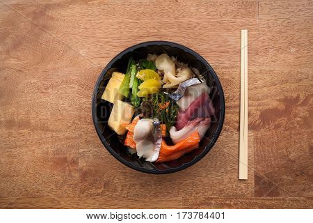 Japanese Food Tekka Don Take Away On Wooden Background