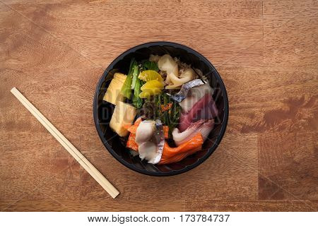 Japanese Food Tekka Don Take Away On Wooden Background