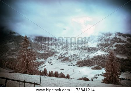 infrared shot of alpine landscape in the simmental valley. photo taken with a modified canon 40d camera.