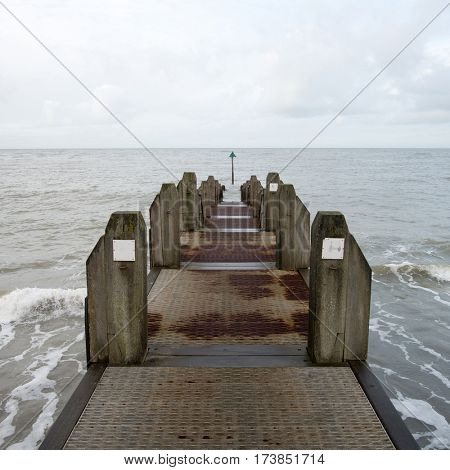 Weathered wooden jetty in Aberystwyth, Wales UK.