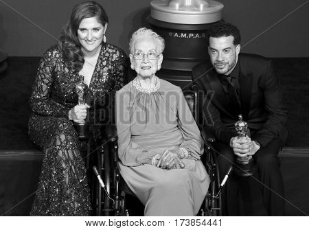 Katherine Johnson, Ezra Edelman and Caroline Waterlow at the 89th Annual Academy Awards - Press Room held at the Hollywood and Highland Center in Hollywood, USA on February 26, 2017.