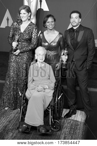 Katherine Johnson, Ezra Edelman and Caroline Waterlow at the 89th Annual Academy Awards - Press Room held at the Hollywood and Highland Center in Hollywood, USA on February 26, 2017.