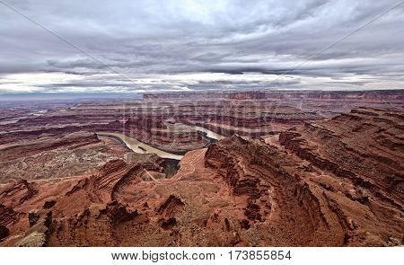 Dirt road on canyon along river bend.  Dead Horse Point. Canyonlands Natioanal Park. Moab. Utah. United States.