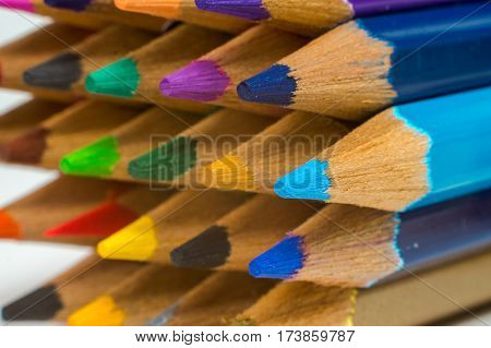close up of colored pencils on isolated white background