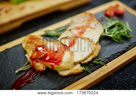 Appetizing meat with tomato sauce and estragon