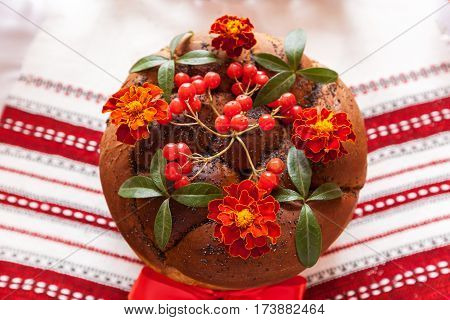 Traditional wedding Ukrainian bread Korovai with flowersWedding round loaf with decoration. Traditional wedding bread.Wedding loaf of bread