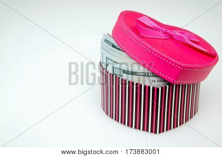 gift box as heart with US currency