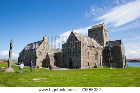 IONA, SCOTLAND, UK-MAY 6th 2016:  Beautiful sunny spring weather was enjoyed by visitors to historic Iona Abbey, Isle of Iona, Scotland on Friday 6th May 2016