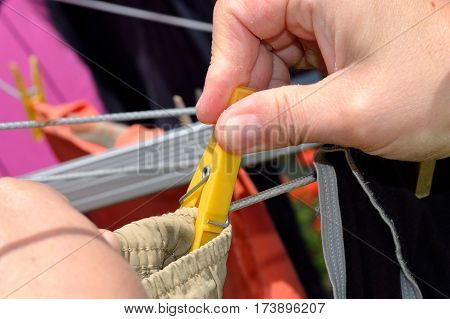 Close-up like person washing on the leash to hang up